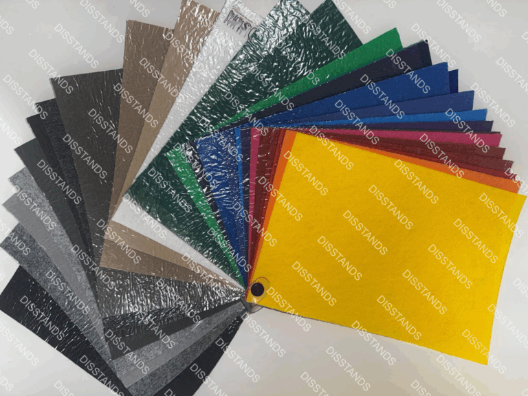Muestrario abanico de moqueta ferial ecológica con más de 20 colores disponibles incluyendo negro gris beige verde azul rojo amarillo para eventos en Barcelona