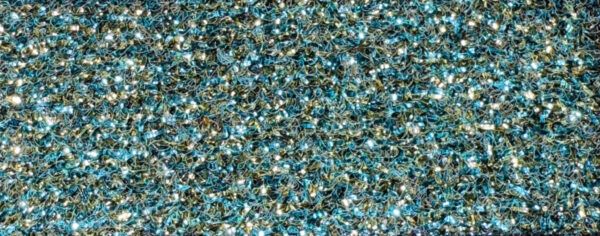 Moqueta decorativa con efecto iridiscente tornasolado en degradado de colores desde marrón rojizo hasta azul púrpura
