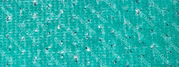 Moqueta técnica con efecto de brillos dispersos disponible en múltiples colores, certificación ignífuga y base sin goma