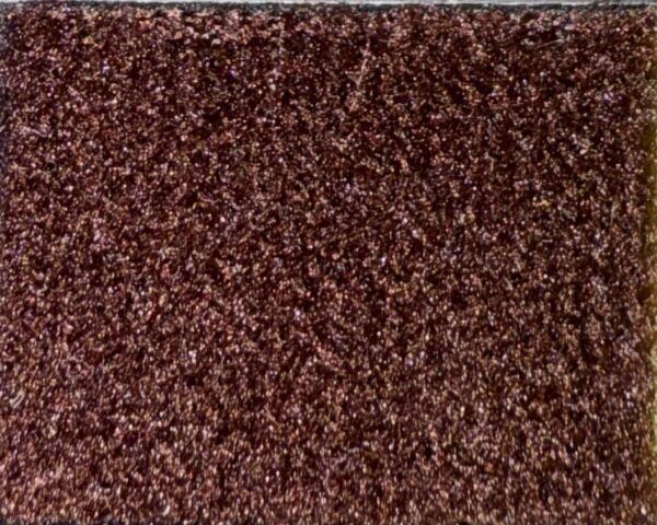 Detalle de textura de moqueta Timelediss tipo rizo en tono morado púrpura vibrante