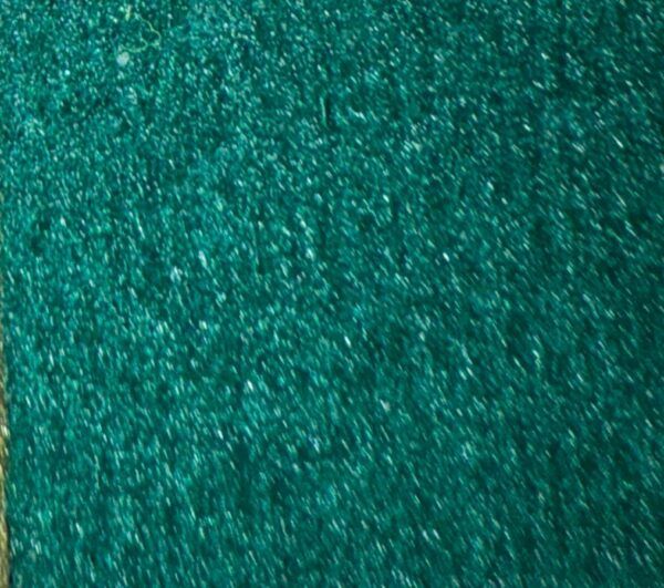 Detalle de textura de moqueta Timelediss tipo rizo en tono morado púrpura vibrante