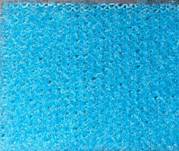 Detalle de textura de moqueta Timelediss tipo rizo en tono morado púrpura vibrante