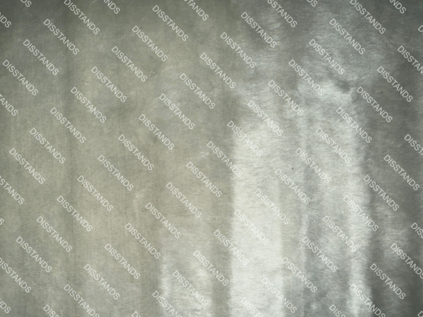 Detalle de textura de moqueta tipo pelo en tono beige caramelo con acabado suave y denso