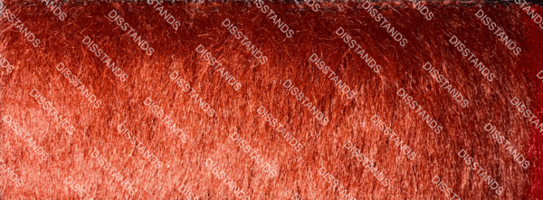 Detalle de textura de moqueta tipo pelo en tono beige caramelo con acabado suave y denso