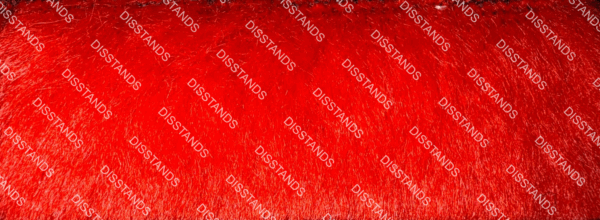 Detalle de textura de moqueta tipo pelo en tono beige caramelo con acabado suave y denso