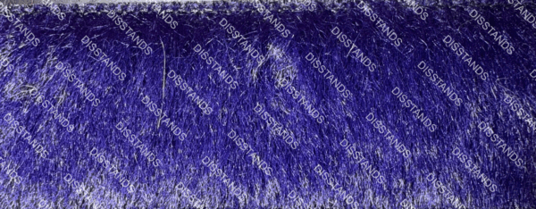 Detalle de textura de moqueta tipo pelo en tono beige caramelo con acabado suave y denso