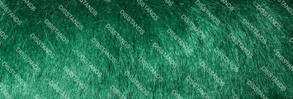 Detalle de textura de moqueta tipo pelo en tono beige caramelo con acabado suave y denso