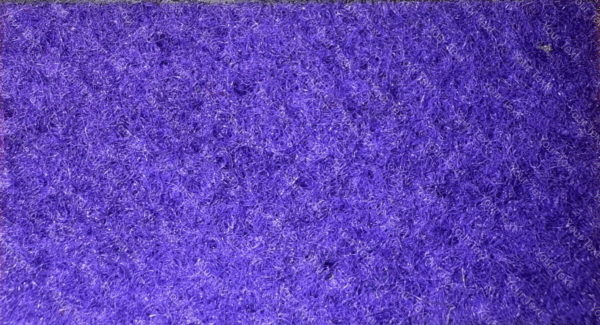 Detalle de textura de moqueta Pigalldis tipo rizo con fibras compactas en tono gris oscuro